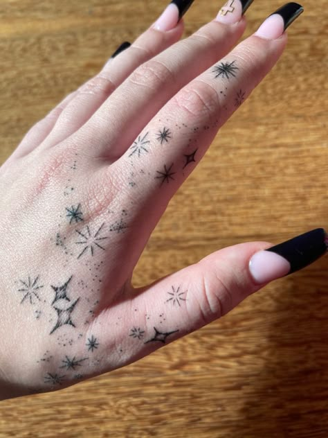 Star Tattoo On Hand For Women, Left Hand Tattoos For Women, Hand Sparkle Tattoo, Hand Tattoos Words, Star Finger Tattoo, Finger Hand Tattoo, Moon Finger Tattoo, Sparkles Tattoo, A Moon Tattoo