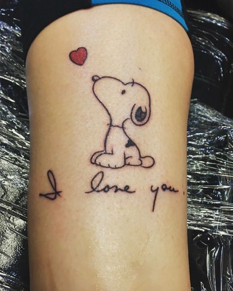 Snoopy tattoo I got for my mom, with her signature underneath saying “I love you” Snoopy Memorial Tattoo, Snoopy Tattoo For Women, Snoopy Tattoo Ideas, Husband Wife Tattoos, Charly Brown, Memorial Tattoo Quotes, Snoopy Tattoo, Wife Tattoo, Couples Tattoos