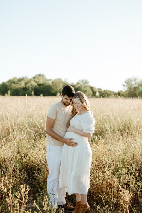 Maternity photo, white cream maternity dress, maternity photo in field, couples maternity photos, nature maternity photos, fall pregnancy photoshoot Cream Maternity Dress Photoshoot, Open Field Maternity Photos, Pregnancy Photos In Nature, Maternity Nature Photoshoot, Neutral Maternity Pictures, Pregnancy Photos Nature, Field Maternity Pictures, Cream Maternity Dress, Fall Pregnancy Photoshoot