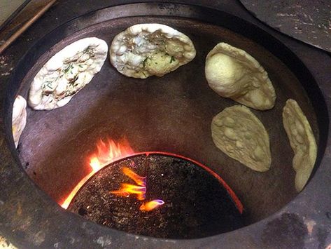 Making naan on a very hot clay tandoor oven. Recipes With Naan, Tandoori Oven, How To Make Naan, Indian Bread Recipes, Tandoori Recipes, Oven Diy, Tandoor Oven, Recipes With Naan Bread, Chicken Gnocchi