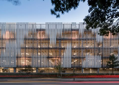 Angled stone surfaces create zigzags across the facade of this hospital building in Copenhagen by Danish firm 3XN Facade Design Pattern, Hospital Building, Garage Pictures, Parking Building, Building Skin, Slanted Walls, Metal Facade, Facade Material, Architecture Facade