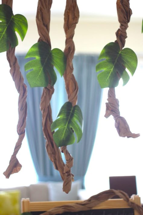 Faux jungle vines from a Jungle Safari Birthday Party via Kara's Party Ideas | KarasPartyIdeas.com (33) Jungle Vines, Jungle Safari Birthday Party, Zoo Birthday Party, Jungle Decorations, Jungle Thema, Jungle Safari Birthday, Jungle Theme Parties, Jungle Theme Birthday, Safari Theme Birthday