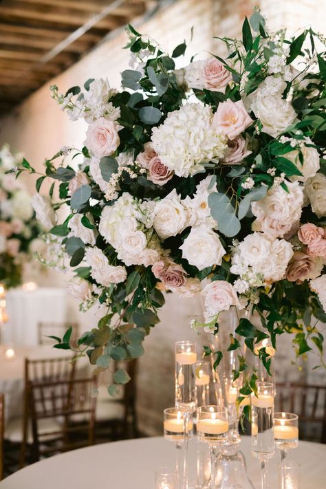 lush hydrangeas and dusty pink roses Pink And White Ceremony Flowers, Eucalyptus And Blush Wedding Table Decor, Dusty Rose Greenery Wedding, Dusty Pink Flower Centerpiece, Blush Sage And White Wedding Flowers, Dusty Rose Flower Centerpieces, Dusty Pink Tall Centerpiece, Blush Roses Centerpiece, Greenery And Pink Wedding