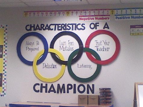 We had an Olympic theme this year, so my mother helped create the Olympic Rings for me! Olympic Bulletin Board, Pe Bulletin Boards, Sports Theme Classroom, Olympics Activities, Sports Classroom, Olympic Theme, Pe Ideas, Olympic Rings, School Theme