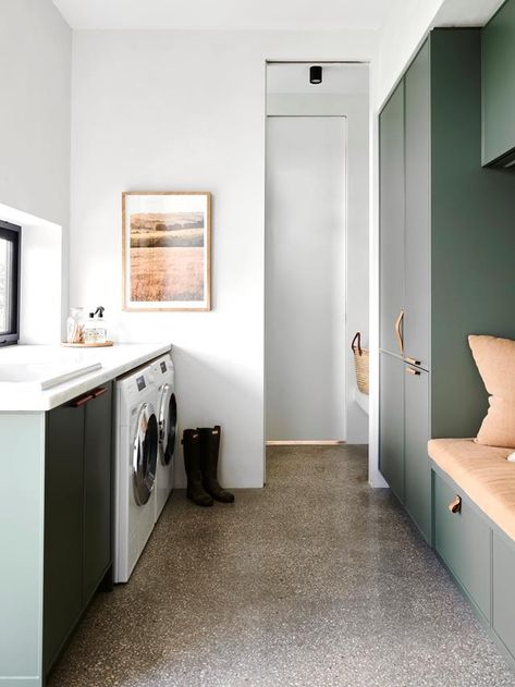 A Renovated And Extended 1970s Home In Fingal, VIC | Inside Out Cement Floor Laundry Room, Green Kitchen Concrete Floor, Concrete Mudroom Floor, Laundry Room Concrete Floor, Laundry Room With Concrete Floor, Concrete Laundry Room Floor, Laundry Bench, Green Laundry Room, Laundry Inspiration