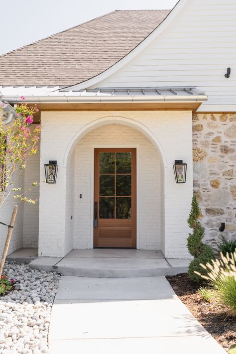 The Modern Cottage — MICAH ABBANANTO English Country Cottage Exterior, Modern Cottage Exterior, Tuscan Cottage, Mediterranean Cottage, Arch Entryway, Arched Front Door, Arched Entry, Brick Porch, Cottage Vibes