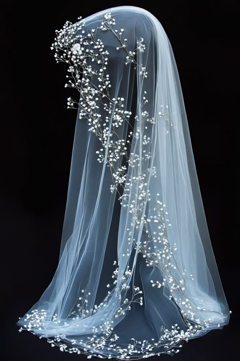 Wedding veil design. White tulle with baby's breath and crest embroidery.

Are you a soon-to-be bride looking for unique ways to switch up traditional wedding styles? Sink your curious eyes into our extensive list of finely-decorated embroidered wedding veils, bound to add a personal touch to your big day. No longer is the veil just a simple sheer fabric, it's your…

Read more: https://tastywed.com/generated-post-38-detailed-embroidered-wedding-veil-collections/ Different Types Of Wedding Veils, Christmas Wedding Veil, Moon Phase Veil, Celestial Veil Wedding, Non Traditional Wedding Veil, Unique Veils Wedding, Colorful Veils, Moon Veil, Celestial Veil