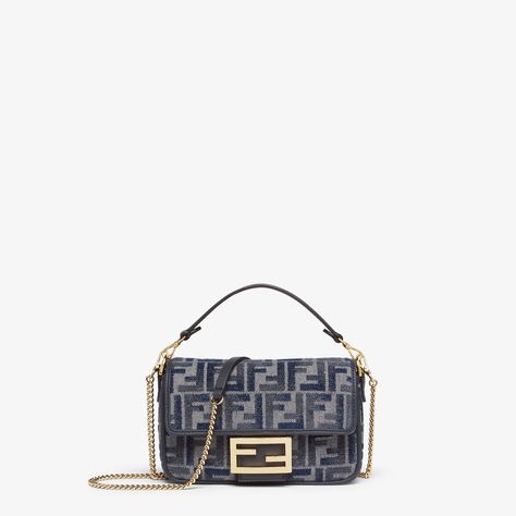 Small iconic Baguette bag made of chenille with the iconic FF motif in dark blue gradient tones, embellished with dark blue calfskin trim and decorated with an FF clasp. Featuring a front flap, magnetic clasp, one gray fabric-lined internal compartment with a calfskin pocket and gold-finish metalware. The bag can be carried by hand, or worn either on the shoulder or cross-body thanks to the calfskin handle and chain shoulder strap, both detachable. Made in Italy Dark Blue Gradient, Fall Fashion Shoes, Fendi Baguette Bag, Limousine Car, Blue Leather Bag, Fendi Baguette, Blue Gradient, Clutch Pouch, Baguette Bag