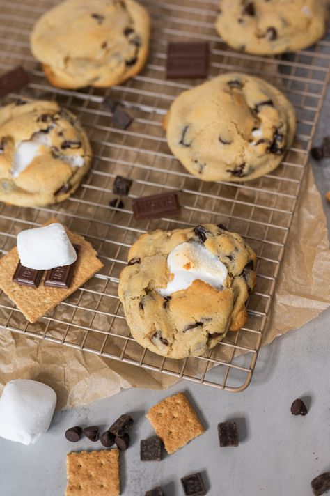 Campfire Dessert Cookies Marshmallow Chocolate Cookies Chewy S’mores Treat Cake Mix Smores Cookies, S'more Chocolate Chip Cookies, How To Make Smores Cookies, Snore Cookies Recipe, Smores Stuffed Cookies, S’more Chocolate Chip Cookies Easy, S’more Cookie Recipe, Smores Cookie Recipes, Crockpot Chocolate Chip Cookie S’mores