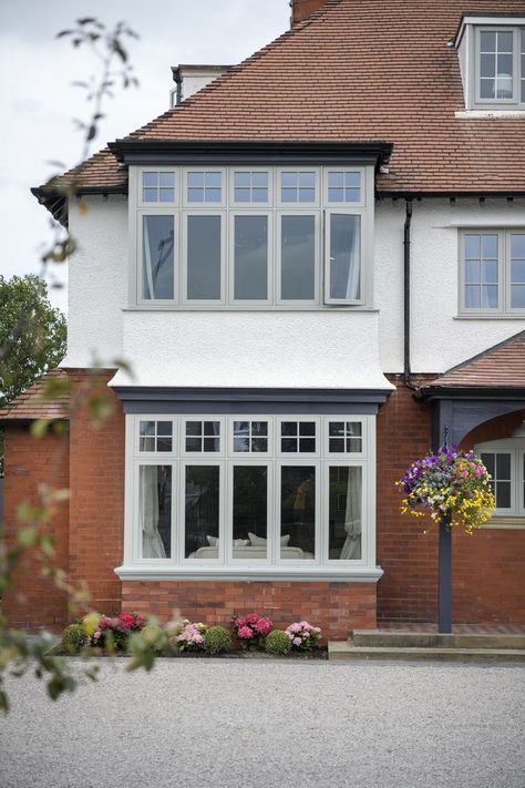 A detached traditional house with flush sash windows in grey 1930s House Exterior Uk, Edwardian House Exterior, 1930s House Extension, 1930s House Exterior, Kitchen Window Ideas, Bay Window Exterior, Flush Casement Windows, Modern Kitchen Window, Window Design Ideas