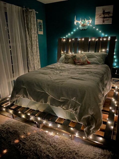 Made this bed fully from pallets i found and painted them and added lights Western Ideas For Bedroom, Country Bed Frame Ideas, Full Size Bed Frame Ideas, Corner Pallet Bed, Country Beds, Pallet Bed Frame With Lights, Queen Size Pallet Bed Frame Diy, Diy Pallet Bed Ideas, Western Bed Frame