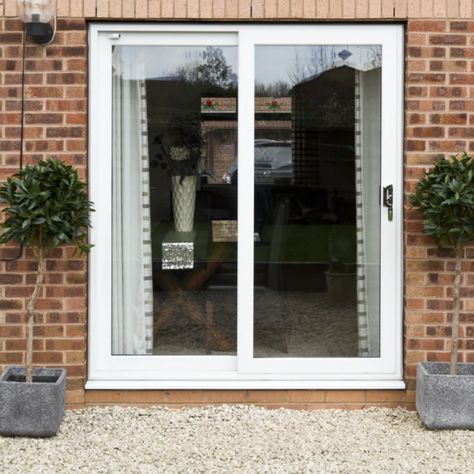 Sliding patio door prices do vary depending on where you look, but be wary of poor quality in your search for cheap quality patio doors. Although Just Value Doors patio door prices are low, our quality is always high. See more at justvaluedoors.co.uk Patio Sliding Doors, Upvc Patio Doors, External Sliding Doors, Aluminium Patio Doors, Modern Patio Doors, Sliding Door Company, Double Patio Doors, External Front Doors, Aluminium Glass Door