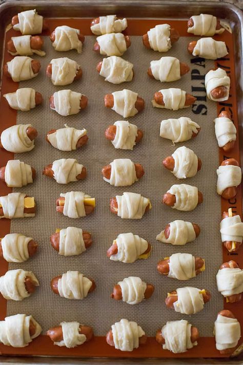 Pigs in a Blanket :: Easy recipe with only two ingredients (three if you want cheese!). Simply wrap mini hot dogs in crescent rolls and bake... Perfect for kids, parties and the Super Bowl! #hotdogs #lilsmokies #crescentdogs #appetizers #snacks #superbowl Piggies In A Blanket, Hot Dog Crescent Rolls, Crescent Dogs, Bridal Brunch Food, Mini Hot Dogs, Kids Recipe, Crescent Roll Recipes, Mini Pigs, Hot Dog Recipes