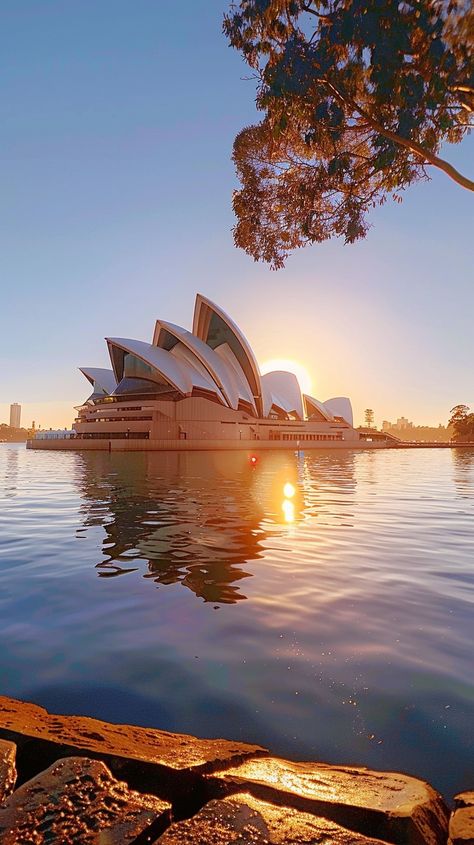 "Sunrise at #Opera: A breathtaking #sunrise casts warm hues over the iconic #SydneyOperaHouse, reflecting peacefully on the #harbor. #sydneylife #architecturephotography #australiagram #aiart #aiphotography #stockcake ⬇️ Download and 📝 Prompt 👉 https://stockcake.com/i/sunrise-at-opera_1099537_720601" Sydney Aesthetic, Goals 2025, Australia Aesthetic, Couple Camping, Melbourne Trip, House Cast, Sydney Skyline, Vision Bored, Semester Abroad