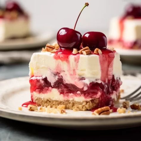 Dive into layers of delight with our Cherry Cheesecake Lush! Creamy cheesecake, vibrant cherries, and a golden Oreo crust create a dessert masterpiece. Perfect for indulgent moments and special gatherings. Get the recipe and treat yourself today! Cherry Cheesecake Lush Layers, Recipes With Cheesecake Pudding, Cherry Cheesecake Lush Dessert, Lush Dessert Recipes, Cherry Cheesecake Lush, Strawberry Cheesecake Lush, Golden Oreo Crust, Cheesecake Lush, Random Desserts