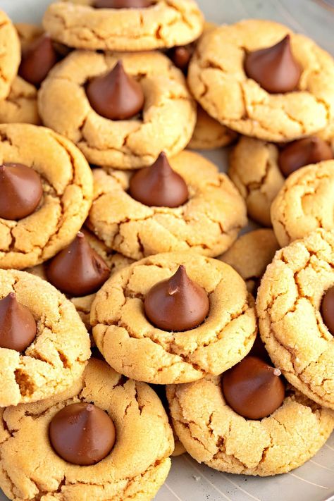 Peanut Butter Blossoms Cookie Recipe - Insanely Good Peanut Butter Chocolate Kiss Cookie Recipe, Softest Peanut Butter Blossoms, Pb Blossoms Christmas, Peanut Butter Cookies Blossoms, Best Peanut Blossom Cookies, Best Peanut Butter Blossoms Recipe, Recipe For Peanut Butter Blossom Cookies, Peanut Blossoms Recipe, Better Homes And Gardens Peanut Butter Blossoms