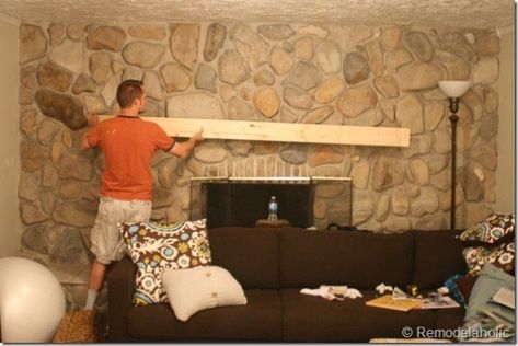 Installing a wood mantel on a stone or brick fireplace wall before Diy Fireplace Mantle, Brick Fireplace Wall, Diy Mantle, Rock Fireplace, Floating Mantel, Wood Mantle, Wood Mantel, Fireplace Shelves, Fireplace Mantles