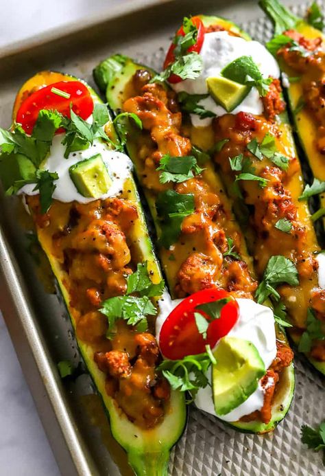 Simple Taco Stuffed Zucchini Boats - Pinch Me Good Zucchini Boats Turkey, Dairy Free Tacos, Taco Stuffed Zucchini, Stuffed Zucchini Boats, Stuffed Zucchini, Zucchini Boats, Easy Taco, Pinch Me, Taco Night