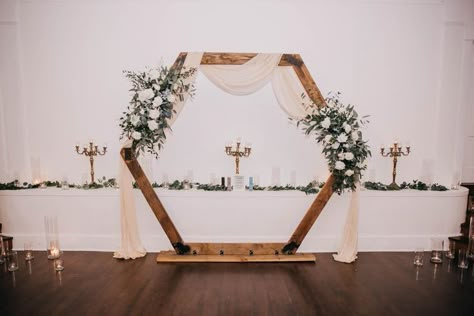 Hexagon Wedding Arch With Sunflowers, Hexagon Wedding Arch Sage Green, Wedding Heptagon Arch, Octogon Archway Wedding Decor, Wood Archway Wedding, Ceremony Hexagon Arch, Wedding Arbor Ideas Hexagon, Octagon Wedding Arch Decor, Octagon Arch Decoration Wedding