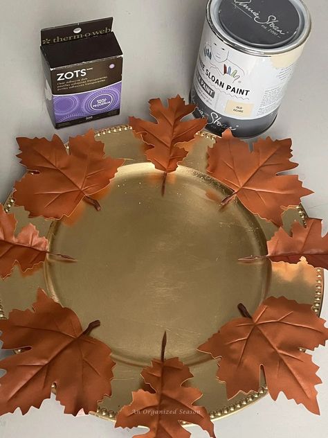 Want to set a table that will wow your guests? A table that looks fabulous but doesn't break the bank! Then, you'll want to make my super easy DIY plate chargers that are perfect for Fall! I'll show you how to use Dollar Tree faux leather leaves to make a beautiful plate charger to upgrade your Autumn tablesettings! Please save this in and follow us for more DIY, seasonal decor, and home organization inspiration! Charger Plate Wreath Diy, Thanksgiving Charger Plates, Charger Decorations Diy, Diy Chargers Plates Ideas, Dollar Tree Charger Plates Diy, Diy Plate Chargers, Charger Plates Diy, Charger Plates Decor, Charger Plate Crafts