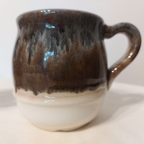 Get that summers-at-the-cabin feeling with this pair of Beauce Pottery Canada vintage ceramic drip-glaze mugs. Lovely grey and brown on cream with a hint of blue-grey around the rim. Measuring approx. 3.75"tall x 4.75" width including handle. Now in the SMV Etsy shop. #CanadianSummers #VintageCanadiana #SMVinStock #SkyMeadowsVintage #CeramiqueBeauce #BeauceCeramics #CanadianCeramics #CanadianPottery Lovely Grey, Vintage Ceramic, Brown And Grey, Blue Grey, Glaze, Cabin, Etsy Shop, Ceramics, Cream