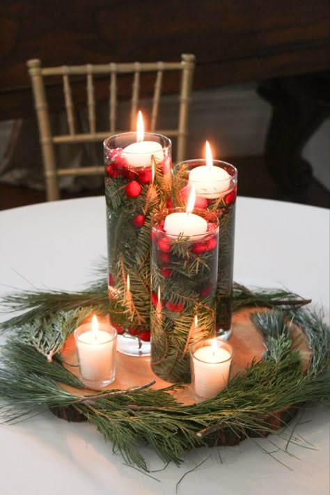 Mini Christmas Tree Centerpiece Wedding, Floating Candles Cranberries, Winter Wedding Cranberry, Holiday Wedding Tablescape, Christmas Party Round Table Decor, Winter Wedding Tablescapes Round, Winter Wedding Centerpieces Table Decor, December Rehearsal Dinner Ideas, Burgundy Winter Wedding Centerpieces