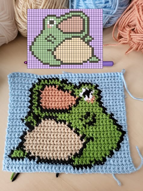 Crochet Tapestry Granny Squares, Pixel Crochet Projects, Frog Crochet Blanket, Square Tapestry Crochet, Minecraft Crochet Tapestry, Grids For Crochet, Crochet Tapestry Studio Ghibli, Crochet Frog Blanket, Frog Tapestry Crochet