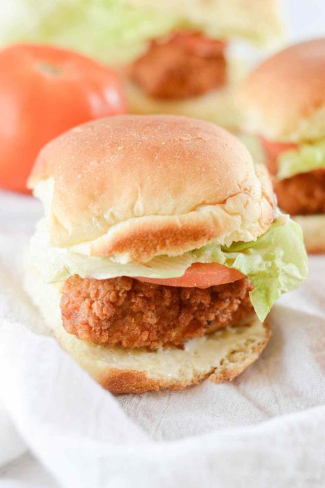 crispy chicken slider on a white surface Crispy Chicken Sliders, Easy Chicken Sliders, Sliders For A Crowd, Buttermilk Crispy Chicken, Tuna Salad Sandwiches, Chicken Panini Recipes, Panini Recipes Chicken, Slider Recipe, Sliders Recipes Chicken