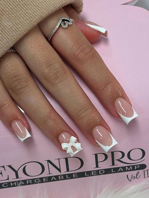 There's a new beauty trend taking over Instagram and it's absolutely stunning. Say hello to "quartz nails". Tapered Square Nails Short French Tip, Wedding Nails Bridesmaid Square, Short French Tip Acrylic Nails With Bow, Christmas Acrylic Nail Designs Short, Short Square French Tip Nails Summer, Square French Tip With Design, Short Square Frenchies, Summer Nails 2024 Coffin, Short Acrylic Nails Ideas Square