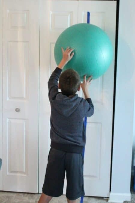 7 Easy Sensory Activities Using a Therapy Ball - Your Kid's Table Sensory Gym Occupational Therapy, Beach Ball Therapy Activity, Easy Sensory Activities, Brain Gym Exercises Kids, Constraint Induced Movement Therapy Activities, Preschool Gymnastics Lesson Plans, Ball Activities, Pregnancy Yoga Ball Exercises, Sensory Processing Activities