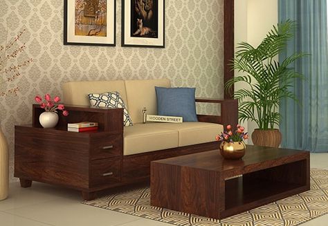 Buy Solace 2 Seater Wooden Sofa Online with Walnut Finish and add this #elegant #two #seater #sofa to your living space for beautiful #interiors and attain #lively impact. Get #2SeaterSofa #with #storage online from the fantastic range #Ahmedabad #Hyderabad #Bhopal #Faridabad Shape Sofa Design, बेडरूम डिजाइन, Sofa Design Living Rooms, Drawing Room Decor, Indian Living Rooms, L Shape Sofa, Wooden Sofa Designs, Indian Home Interior, Wooden Sofa Set