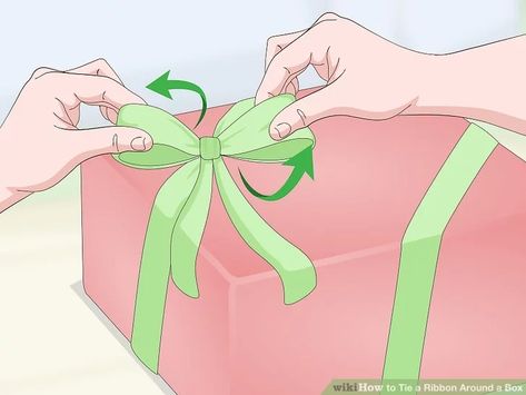 3 Ways to Tie a Ribbon Around a Box - wikiHow Ways To Tie A Ribbon, Ribbon On Presents, Christmas Present Ribbon, Bows For Presents, Diy Gift Bow, Package Bows, Ribbon Box, Fancy Bows, Gift Wrapping Techniques