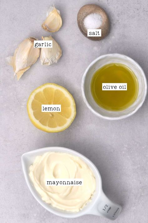 My quick & easy homemade garlic aioli recipe is a creamy blend of lemon and garlic that elevates this garlic mayo sauce to a restaurant-style aioli. Plus, it's easy to make and the perfect dipping sauce for parties (or just to have on your own). Mayo Sauces, Lemon Aoli Dressing, Garlic Lime Sauce, Garlic Sauce For Sandwiches, Lemon Mayo Sauce, Lemon Aioli Recipe, Lemon Aoli Recipe Easy, Garlic Aioli Easy, Alioli Sauce