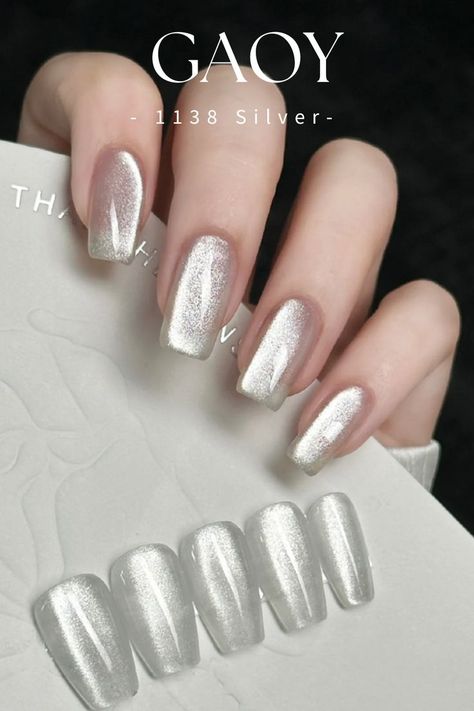 GAOY Silver Glitter Cat Eye Gel and Magnet Gel Manicure and Nail Art DIY at Home White Silver Cat Eye Nails, Silver Cateye Nailart, Silver Cateye Nail, Cat Eye Silver Nails, Cat Eye Nails Silver, Silver Magnetic Nails, White Magnetic Nails, Cat Eye Nails White, Nail Ideas Cat Eye