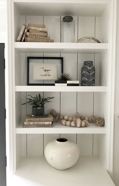 design indulgence: BOOKSHELVES BEFORE AND AFTER Built In Shelf Decor, Bookshelf Styling Living Room, Minimalist Bookshelves, Styling Living Room, Shelf Decorating, Billy Ikea, Styling Bookshelves, Minimalist Shelves, Built In Shelves Living Room