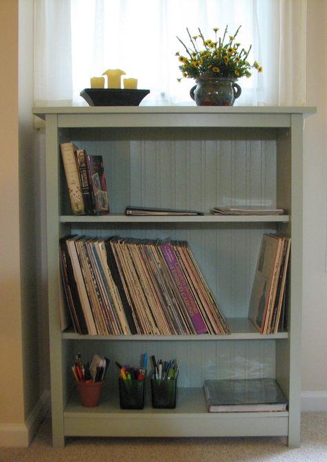 DIY sage green bookcase with beadboard backing. Bookshelf With Beadboard Back, Sage Green Shelves, Sage Green Bookshelves, Sage Green Shelf, Bookcase Next To Bed, Small Vintage Bookshelf, Olive Green Bookshelf, Light Green Bookshelf, Sage Green Bookcase