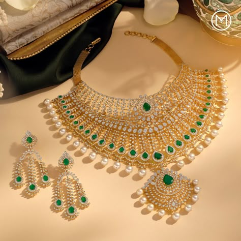 When skilled craftsmanship and glamour meet, what is conceived is jewellery that masterfully combines diamonds and coloured stones. Dazzle with brilliance as you grace yourself with this captivating piece. #BridesOfIndia #MalabarGoldAndDiamonds #ShowTheWay #IndianBrides #BridalJewellery #DiamondJewellery #Diamond Indian Diamond Jewellery Set, Maharaja Jewellery, Creative Jewellery Photography, Malabar Gold Jewellery, Malabar Jewellery, Jewellery Photoshoot, Indian Diamond Jewellery, Beautiful Jewelry Diamonds, Fancy Diamond Ring