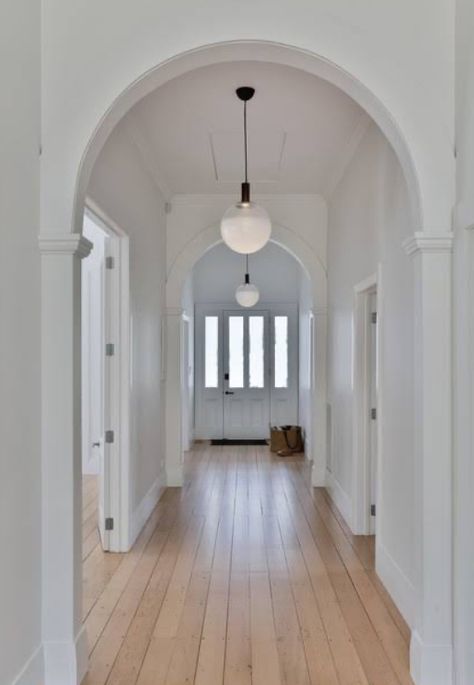 Arch Hallway, Arched Hallway, Doors Hallway, Ortho Office, Wrought Iron Staircase, Modern Apartment Decor, Cape Cod Home, Harrison Design, Stained Doors