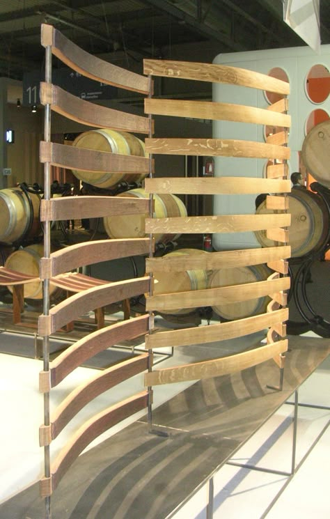 Room divider made from reclaimed wine barrel slats. @Milan 2012 Wine Barrel Art, Whiskey Barrel Ideas, Barrel Crafts, Macrame Room Divider, Barrel Art, Room Divider Decor, Small Room Divider, Wine Barrel Ideas, Room Divider Shelves