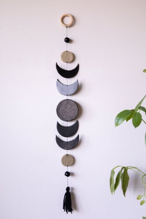 Handcrafted Polymer Clay Wall Hangings for your home. A piece that will add a little flare and color to your walls. If you have any questions or concerns, I'm happy to help best way I can! Measurements : Colors are - Black w/gold sparkle, Gray, & Gold w/gold sparkle *26in long (from top of wood ring to bottom of tassel) *3in wide * (can be longer or a little shorted if needed) *2oz in weight so very lightweight *painted wooden beads, made with polymer clay #handmadeceramics #ceramic Clay Wall Hanging, Air Dry Clay Projects, Deco Nature, Hanging Home Decor, Clay Wall, Diy Clay Crafts, Gold Sparkle, Diy Clay, Diy Home Crafts