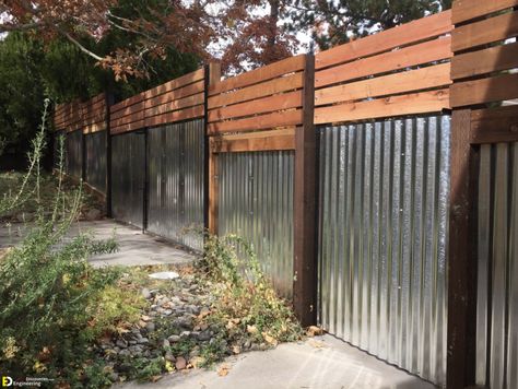 35 Most Attractive Corrugated Metal Fence Ideas For Your Home | Engineering Discoveries Metal Garden Beds Corrugated, White Corrugated Metal Fence, Corrugated Metal Wall Exterior House, Fence With Corrugated Metal And Wood, Metal Fence Ideas, Raised Garden Beds Metal Corrugated Tin And Wood, Corrugated Metal Fence, Home Engineering, Metal Fence Panels