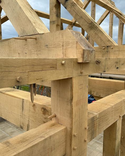 A stunning house frame recently erected not far from Green Oak Carpentry HQ. It was great to work with @halcyon.build again and we look forward to seeing the finished product. #oak #oakframe #oakframing #oakbeams #traditionalcarpentry #greenoak #timber #construction #buildingdesign #buildings #bridge #bridgeoftheday #craftsman #craftsmanship #timberframing #timberframe #petersfield #liss #rake Timber Frame Construction Detail, Wooden Computer Desk, Timber Frame Plans, Timber Frame Joinery, Conservatory Design, House Frame, Timber Frame Barn, Timber Frame Building, Timber Frame Construction