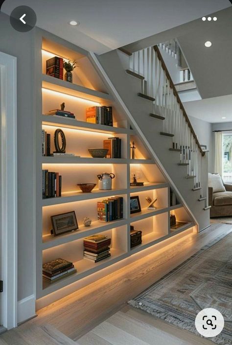 Designs For Under Staircase, Under The Stairs Open Space, Study Area Under Staircase, Stairs In Hall, Book Shelves Under Stairs, Under Stair Shelving, Staircase Down Area Design, Staircase Cabinet Design, Bookcase Under Stairs