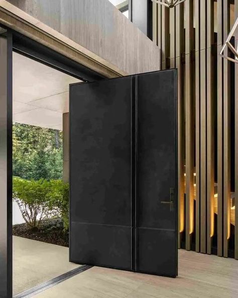 Make an Entrance with a Stunning Pivot Door 🚪✨ Bold, elegant, and functional—pivot doors create a seamless flow while making a statement. The perfect blend of design and impact for any modern home. Available at @allmoderndoors. #PivotDoor #ModernDesign #CurbAppeal #AllModernDoors #InteriorStyle #ArchitecturalDesign #HomeImprovement #DesignMatters Large Pivot Front Door, Florida Homes Exterior, Fromt Doors, Seamless Door, Dream House Modern, Modern Mountain House, Exterior Of House, House Contemporary, Pivot Door