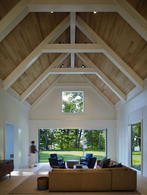 Booth Hansen along with Scott Christopher Homes designed this beach style retreat located in New Buffalo, Michigan. #livingroom Vaulted Ceiling Beams, Vaulted Ceiling Ideas, Painted Beams, Vaulted Ceiling Living Room, Popular Living Room, Tongue And Groove Ceiling, White Beams, Light Hardwood, Cathedral Ceilings