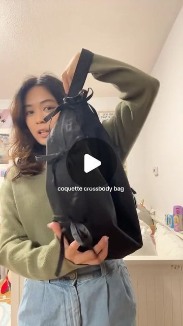 alyssa || beauty + lifestyle on Instagram: "coquette crossbody bag 🎀🤍

actually the cutest bag ever from @oakandfort when I saw it on their website I knew I had to get it, it’s literally so me core lolol

I love the bow details and it fits so much! reminds me of baggu and uniqlo bags but with coquette aesthetics 🙂‍↕️

#ribbons #bows #coquette #coquetteaesthetic #uniqlobag #oakandfort #cutebags #travelpurse #blackbag #vancouver #lifestyle #everydaybag #schoolbag #baggu" Uniqlo Crescent Bag Outfit, Uniqlo Crossbody Bag, Vancouver Lifestyle, Uniqlo Bag, Bag Uniqlo, Uniqlo Outfit, Bows Coquette, Outfit Ideas Cute, Uniqlo Bags