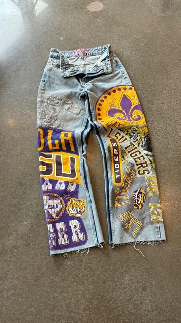 Kenz 🪡 on Instagram: "LSU Denim ✂️" Diy Spirit Jeans, Game Day Diy Outfit, Painted Jeans For Football Games, Lsu Gameday Outfit, Lsu Clothes, Cute Gameday Outfits, Lsu Game Day Outfit, College Jeans, Chiefs Jacket