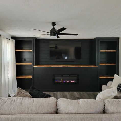 Basement Fireplace With Tv Built Ins, Black Fireplace With Black Wall, Diy Built In Entertainment Center Fireplace, Black Built In Fireplace And Tv, Dark Fireplace Tv Wall, Dark Feature Wall Living Room Tv, Moody Basement Fireplace, Black Cabinets Living Room Built Ins, Moody Living Room Built Ins