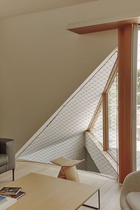 Photo 7 of 19 in An Architect’s Slim Home Emphasizes the Outdoors and Aging in Place - Dwell Butterfly Stool, Light Hardwood Floor, Sori Yanagi, Basement Studio, Light Hardwood, Light Hardwood Floors, Living Room Light, Light Well, Aging In Place