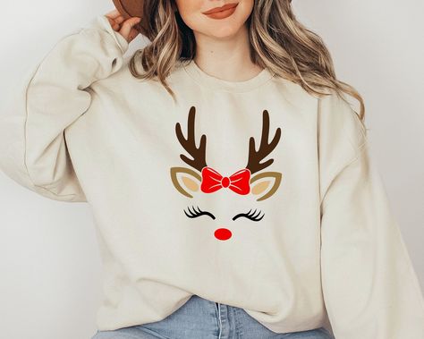 Christmas Sweatshirt, Reindeer Christmas Sweatshirt, Reindeer Face Sweatshirt, Reindeer Shirt for Woman, Christmas Shirt for Mama  ORDER INSTRUCTIONS  ➤ Check and review all listing photos. ➤ Pick up your item's size and color from drop down menus. ➤ Choose the quantity. ➤ Click "Add to Cart" button. ➤ Fill in the personalization box as recommended if provided.  ➤ You can go back to add more item or you can complete the checkout process. ➤ Click "Proceed to Check Out".  WHICH SIZE FITS ME BEST Reindeer Shirt Ideas, Reindeer Outfit Women, Reindeer Tshirts, Christmas Sweatshirt Ideas, Reindeer Shirt, Reindeer Face, Daycare Ideas, Christmas Guide, Spirit Week